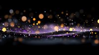 Magical glowing particles and bokeh lights creating wave pattern against dark background, purple and golden sparkles floating in abstract space.