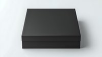 Minimalist black square box with lid on white background, elegant packaging mockup for luxury products and premium brand presentations.