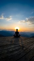 Person meditating in lotus position on wooden deck at sunrise with mountain landscape and dramatic sky for wellness and mindfulness concepts.