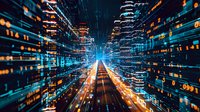 Abstract digital cityscape with glowing blue and orange light trails creating futuristic perspective tunnel effect, representing technology and data flow in modern urban environment.