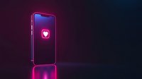 Modern smartphone displaying glowing pink heart icon on dark background with neon reflection, futuristic dating app concept for mobile applications.