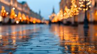 Wet cobblestone street reflecting golden holiday lights in historic European city center at dusk, creating magical festive atmosphere.