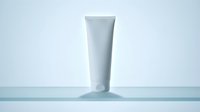 Blank white cosmetic tube mockup on light blue background, perfect for branding cream, lotion or skincare product packaging design.