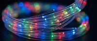Colorful LED string lights with vibrant rainbow illumination creating festive atmosphere for holiday decorations and celebrations.