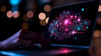 Glowing pink and blue digital network visualization on laptop screen with bokeh background, hands typing in dark environment. Modern technology concept.