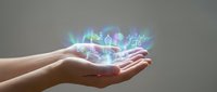 Cupped hands holding glowing holographic medical icons including stethoscope, heart, pills and healthcare symbols floating above palms against neutral background.