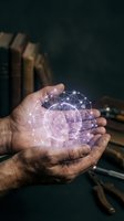 Weathered male hands holding a glowing holographic brain with neural network connections, blending knowledge and technology concepts.