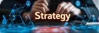 Business strategy concept with glowing text and digital network connections over professional hands working at modern desk, suitable for corporate presentations.
