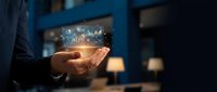 Businessman holding glowing digital network interface with connected nodes and data visualization in office environment for technology and innovation concepts.