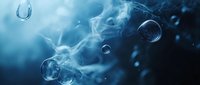 Ethereal bubbles floating in mystical blue underwater environment with swirling smoke-like formations creating dreamy atmospheric effect.
