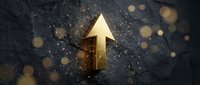 Golden arrow pointing upward on dark textured surface with sparkling particles and bokeh lights creating motivational business growth concept.