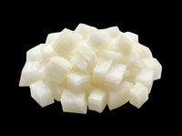 Diced white onion pieces isolated on transparent background, ready for culinary design, recipe graphics, food packaging, cooking blogs, restaurant menus, and print-on-demand kitchen products.