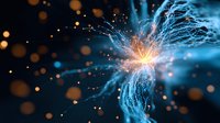 Glowing blue and orange energy burst with light trails and particles against dark background creates dramatic scientific or technological effect.