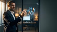 Professional Caucasian businessman in suit interacting with futuristic holographic interface technology in modern office environment for business innovation.