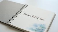 Spiral-bound notebook with motivational text and watercolor accent, suitable for journaling, mindfulness, wellness, and personal development projects.