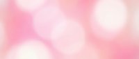 Soft pink and white bokeh background with blurred circular light effects, suitable for romantic, beauty, wellness, and design projects.