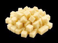 Diced white cheese cubes isolated on transparent background, ready for culinary design, food packaging, recipe graphics, cooking blogs, restaurant menus, and print-on-demand food illustrations.