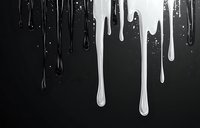 Black and white dripping paint effect with glossy liquid streams flowing down against dark background, creating dramatic contrast.