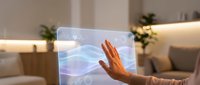 Futuristic holographic display with hand gesture control in modern smart home interior showcasing advanced technology and digital interface innovation.