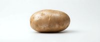 Russet potato with brown skin isolated on white background, suitable for food, cooking, nutrition, and grocery retail applications.