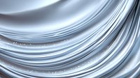 Elegant silver satin fabric waves with soft folds and sparkles creating luxurious flowing curves and graceful lines against light background for wedding and fashion designs.