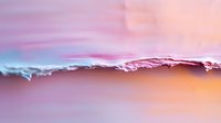 Dreamy abstract macro photography of torn paper edges creating soft pastel layers in pink, orange and blue tones, artistic background for design projects.