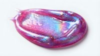 Vibrant pink and purple glitter slime with rainbow shimmer effects, stretchy and moldable texture for sensory play and stress relief.