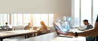 Businessman holding laptop displaying holographic digital avatar for remote communication and virtual meeting in modern office workspace with team in background.