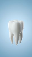 White tooth model on light blue gradient background for dental healthcare and oral hygiene concepts.