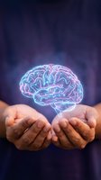 Glowing neon brain floating above cupped hands with purple blue background representing mental health, neuroscience, psychology, artificial intelligence concepts.