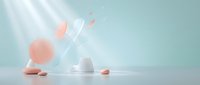 Cosmetic skincare products with geometric shapes and spheres arranged on light background for beauty and wellness marketing.