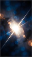 Bright star burst with lens flare and bokeh lights on dark blue background for cosmic space design projects.