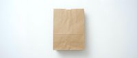 Brown paper bag isolated on white background for eco-friendly packaging, shopping, lunch storage, and sustainable retail branding applications.