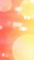 Soft gradient background transitioning from coral red to warm yellow with blurred bokeh light effects, suitable for web design, presentations, and creative projects.