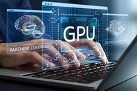Hands typing on laptop with holographic GPU interface, brain visualization and machine learning data processing graphics for tech presentations.