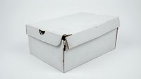 White cardboard shoe box with lid and metal clasp closure isolated on white background for storage and organization solutions.