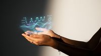 Businessman hand holding glowing digital financial charts and graphs, representing data analysis, investment growth, and stock market trading for business and finance concepts.