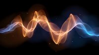 Glowing orange and blue wave lines flowing through dark space with luminous particles creating dynamic light effect for abstract background designs.