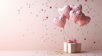 Pink heart-shaped balloons tied to white gift box with bow, surrounded by floating hearts and golden confetti on soft pink background for Valentine's day.