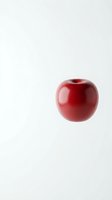 Single red cherry fruit isolated on white background for healthy eating and nutrition concepts.