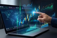 Business professional analyzing financial data on laptop with interactive trading charts and market graphs for investment strategy and economic analysis.