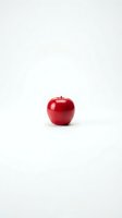 Single red apple isolated on white background for healthy eating and nutrition concepts.