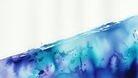 Abstract watercolor background with flowing blue and turquoise paint creating organic shapes and textures for creative design projects.