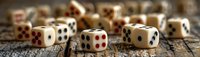 Vintage gambling dice scattered on rustic wooden table, close-up panoramic view showing dots and numbers on antique ivory colored gaming pieces.