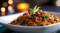 Delicious spiced rice pilaf with caramelized onions and fresh herbs served in white bowl, perfect for restaurant menus and culinary content.