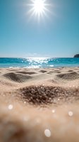Bright sun rays over turquoise ocean waves with sandy beach in foreground, creating sparkling bokeh effect on golden sand grains. Serene summer seascape.