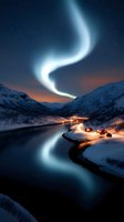 Magical northern lights dance over snowy mountain landscape with illuminated cabins by fjord, reflecting aurora in calm water during polar night in Norway.