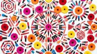 Vibrant geometric mandala pattern with colorful floral motifs and radiating designs on white background. Seamless repeating tile for textile and decor.