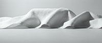Dramatic snow-covered mountain peaks in monochrome creating abstract sculptural forms against minimalist winter landscape for modern interior design.