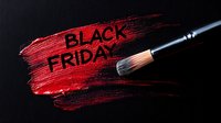 Red paint brush stroke with Black Friday text on dark background, artistic promotional design element for seasonal sales and marketing campaigns.